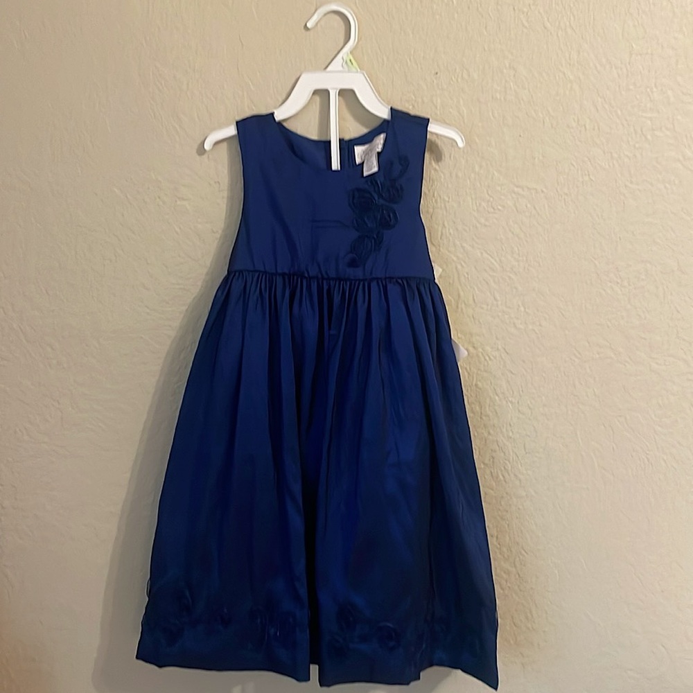 Brand is Heirlooms by Polly Flinders it’s a pretty dark blue color, Size 5T